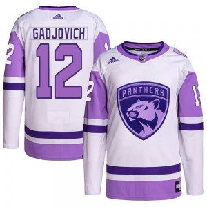 Men's Adidas Florida Panthers Jonah Gadjovich White/Purple Hockey Fights Cancer Primegreen Jersey - Authentic